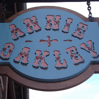 Annie Oakley storefront sign